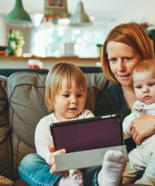 image of mother with kids working